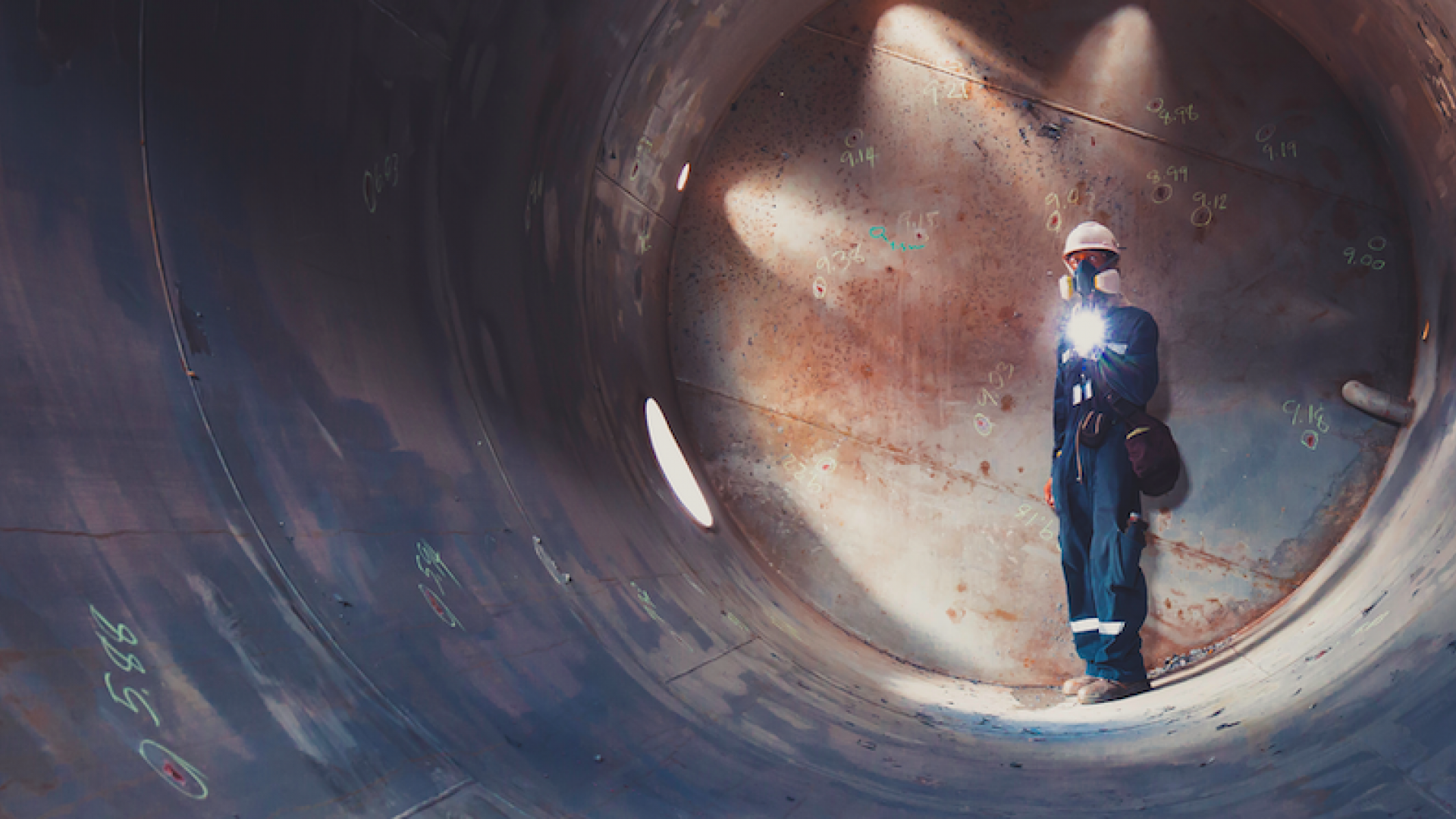 Working male inspection weld underground of tank equipment tunnel