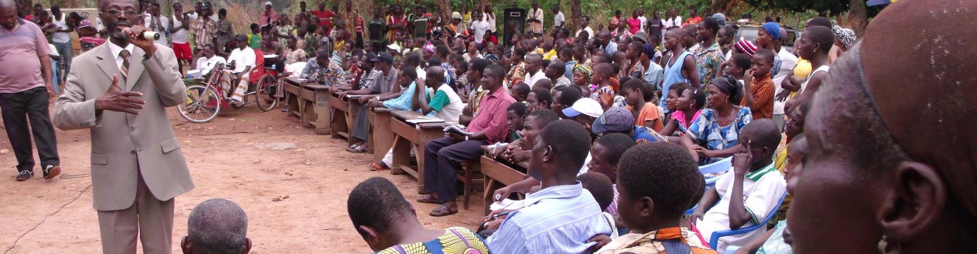 EITI-Togo discussing findings from their EITI Report with the local community in Pagala village, close to the country's largest open cast marble mining site.