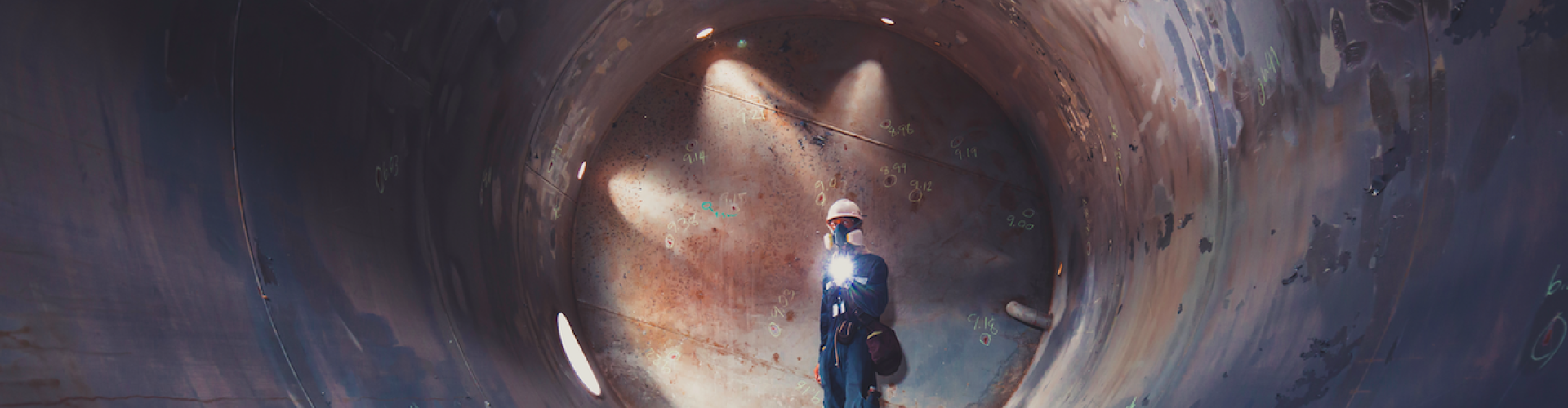 Working male inspection weld underground of tank equipment tunnel