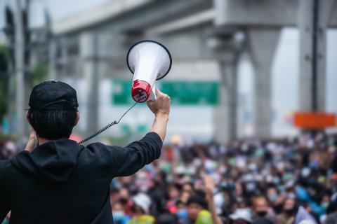 Person holding a megaphone