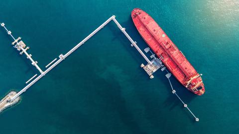 Oil tanker ship at maritime loading terminal 